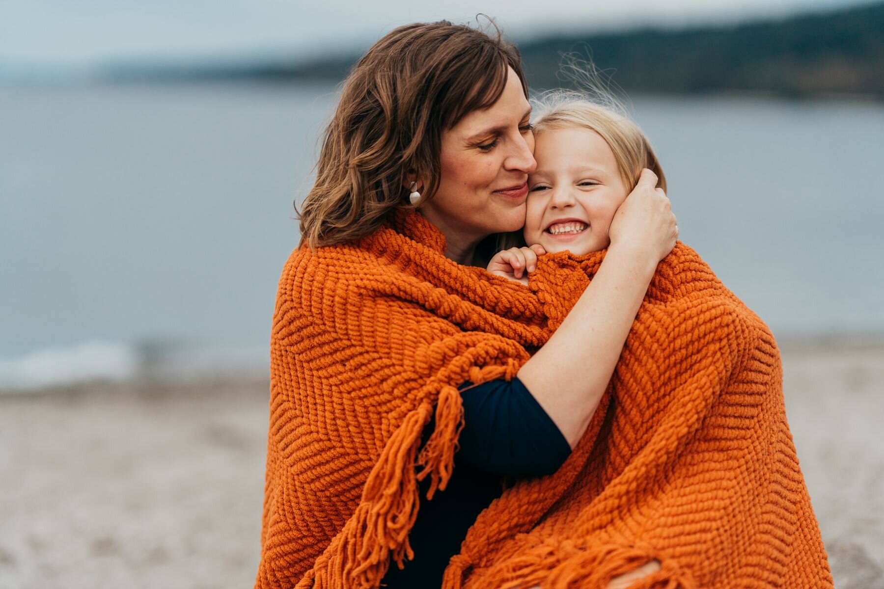 Seattle beach maternity session Sammamish Family photographer - mom hugging daughter
