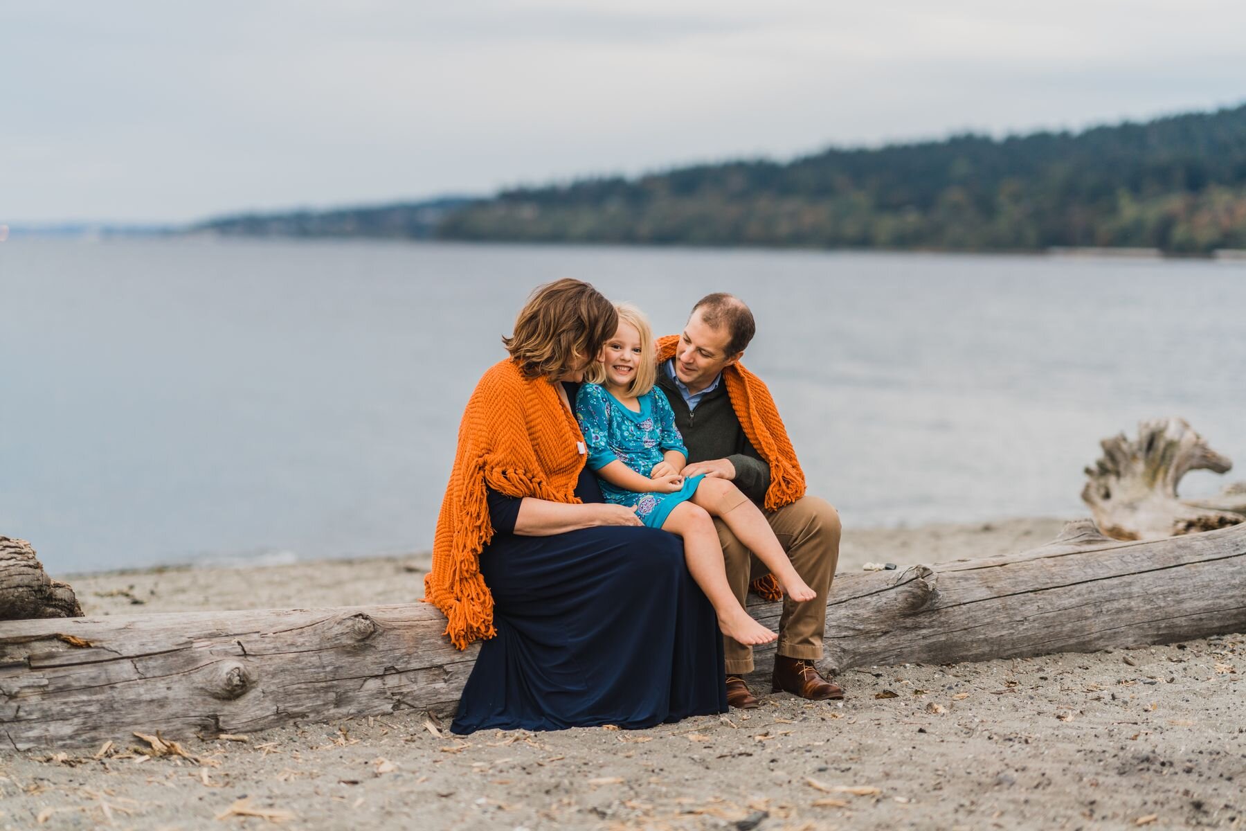 Seattle beach maternity session Sammamish Family photographer family of 3 sitting on log