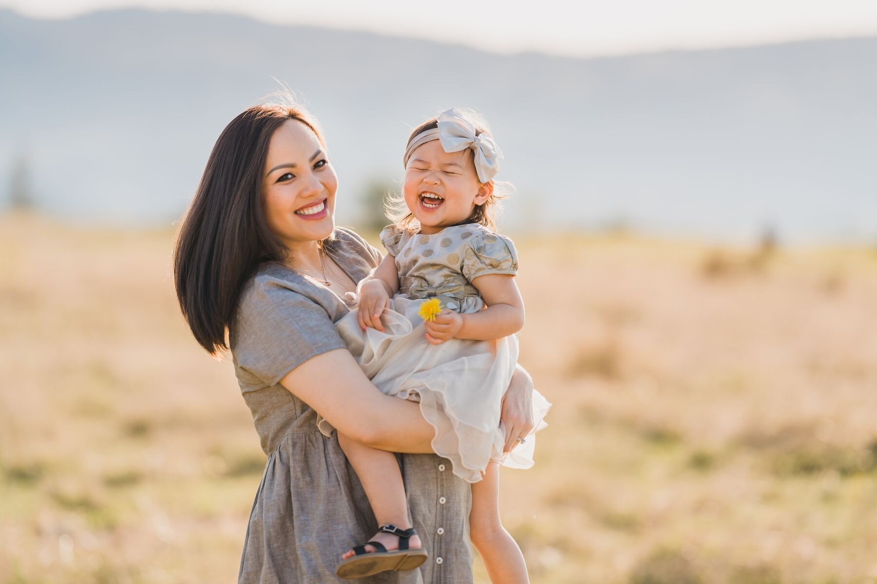 Seattle family session mom holding her girl