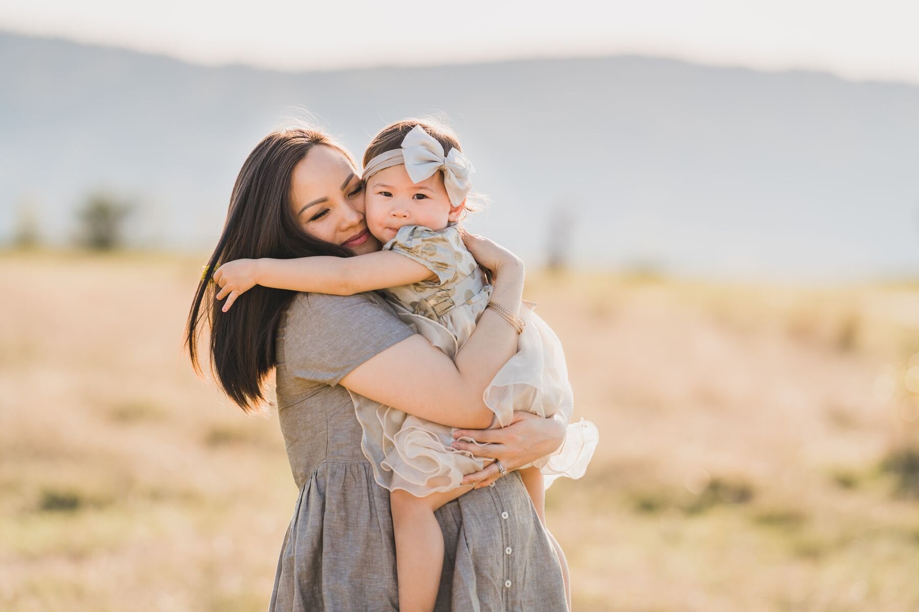 Seattle family photo session mom hugging her little girl