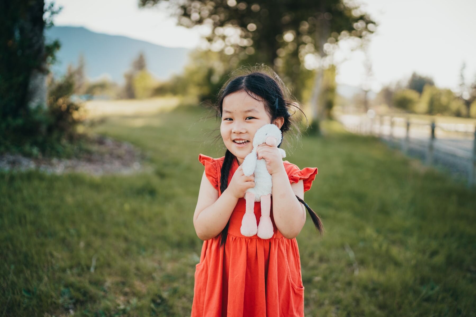 Bellevue family photo session - little girl showing off stuffie