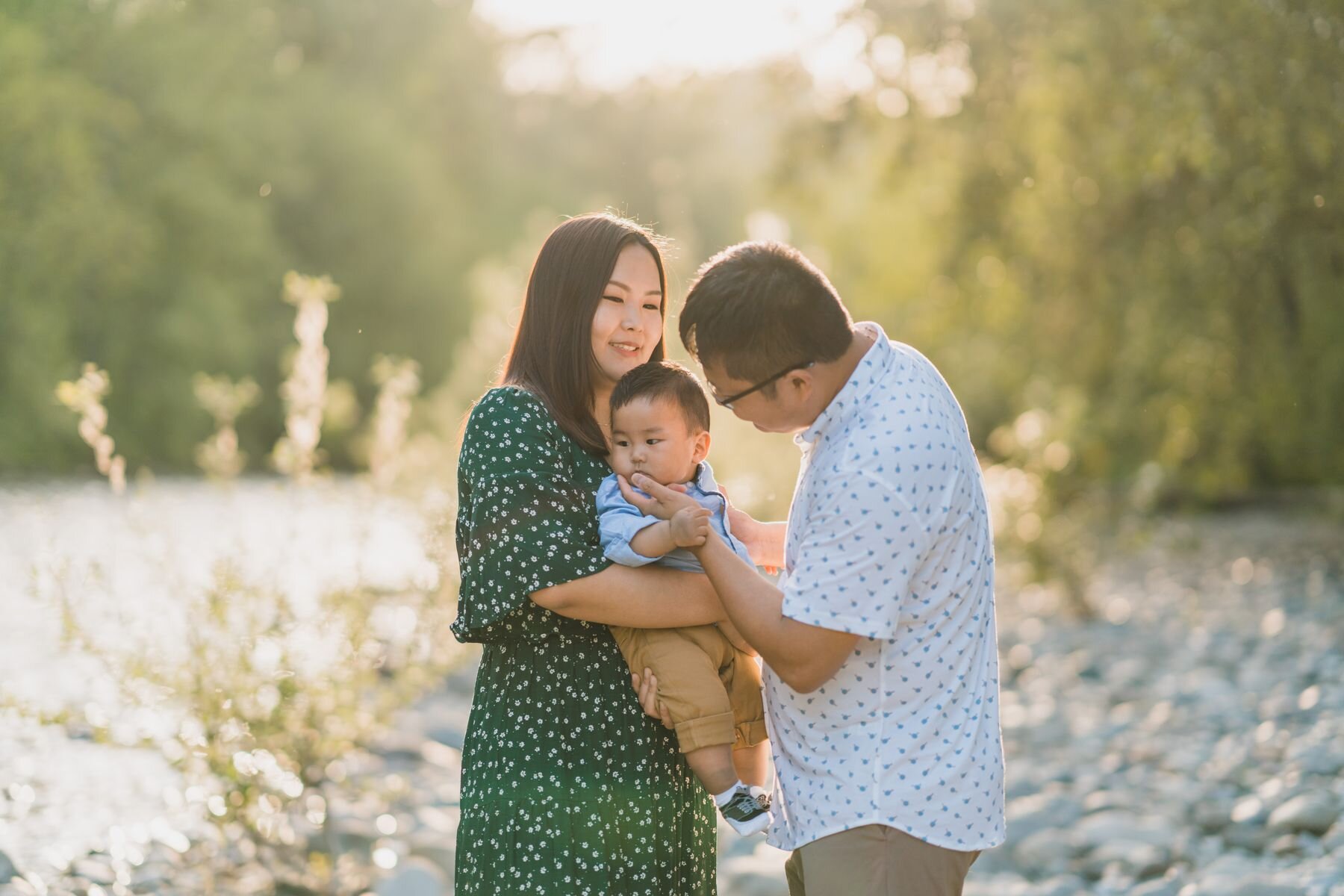 Issaquah family photographer - family loving on baby