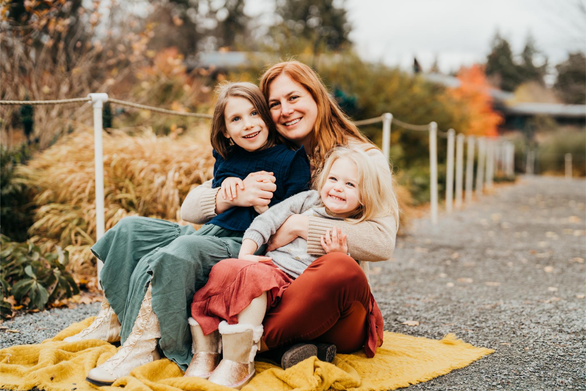 bellevue mom taking family photo with her two adorable smiling kids